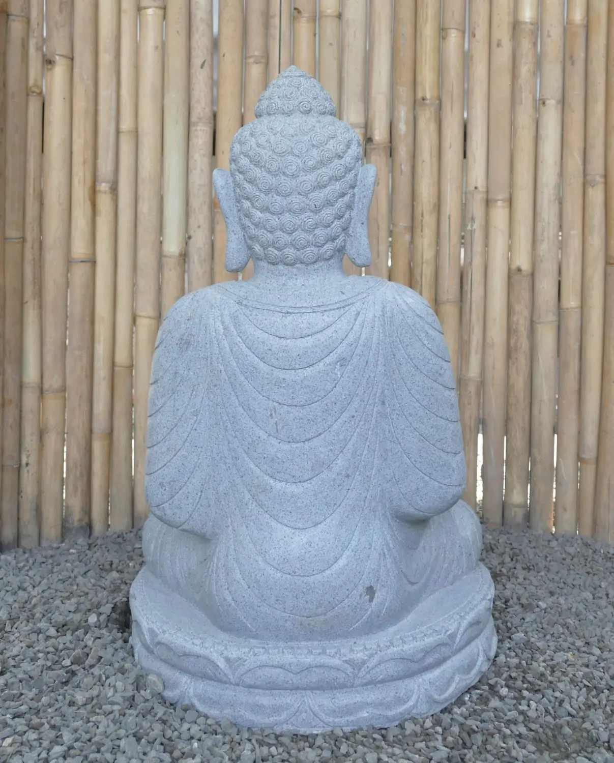  Product image 4 of the product “Seated Buddha made of Riverstone in Bhumisparsha - gesture of touching the earth. 82cm height. ”